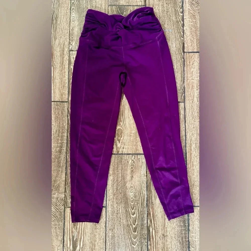 FP Movement Breathe Deeper High-Rise V
Knotted Waist Ankle Leggings Purple
